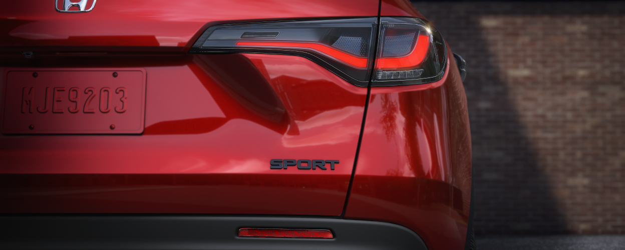 Closeup of tailgate on a red HR-V Sport. 