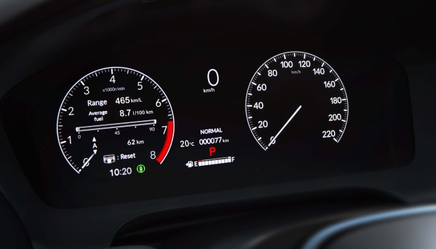 Close up of TFT screen, displaying tachometer, speedometer, odometer, fuel, etc.