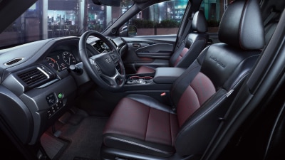 Side view of Ridgeline Black Edition’s front seats.