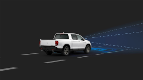 Side view of white Ridgeline in black CGI space. Blue sensor waves and lines emit from the front.
