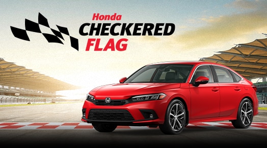 3/4 front view of red Civic in front of a racetrack, with the Honda Checkered Flag logo.