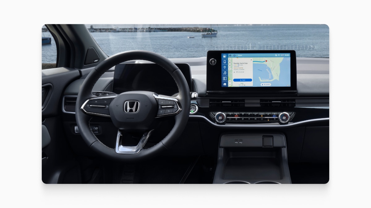 Honda vehicle interior with Google Maps opened on the screen.