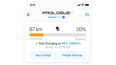 Closeup of a smartphone. On the smartphone’s screen is a Prologue diagnostics page. Readouts detail a 20% battery charge and a 97-kilometre driving range.