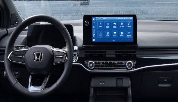 Medium closeup of the centre console touchscreen in a Honda.