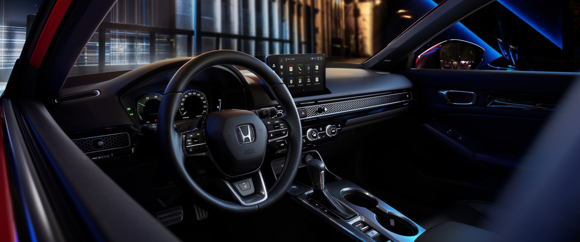 Interior view of steering wheel and cabin.