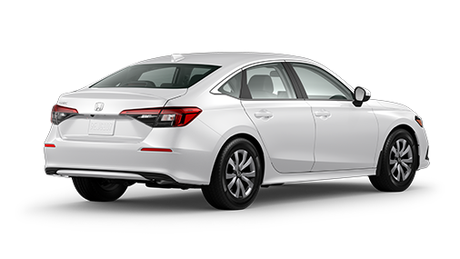 ¾ driver side rear facing view of 2023 Civic Sedan LX model in Platinum White Pearl colour