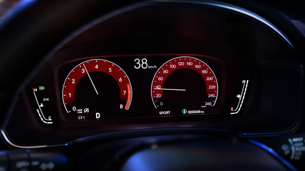 Close up of TFT screen, displaying tachometer, speedometer, odometer, fuel, etc. 