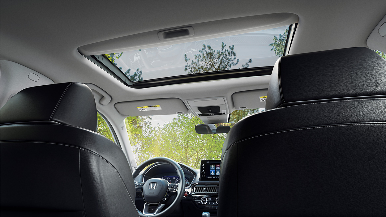 3/4 worm’s eye view of open moonroof.