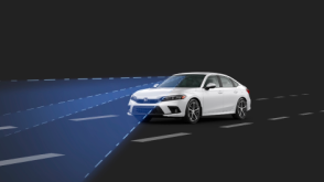 3/4 front view of white Civic Sedan. Blue sensor waves and lines emit from the front.