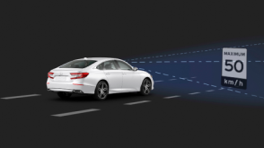 3/4 rear view of white Civic Sedan. Blue sensor waves and lines emit from the front, detecting a traffic sign.