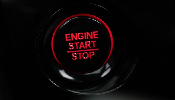 Close up of engine start button.