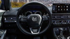 Closeup of steering wheel. 