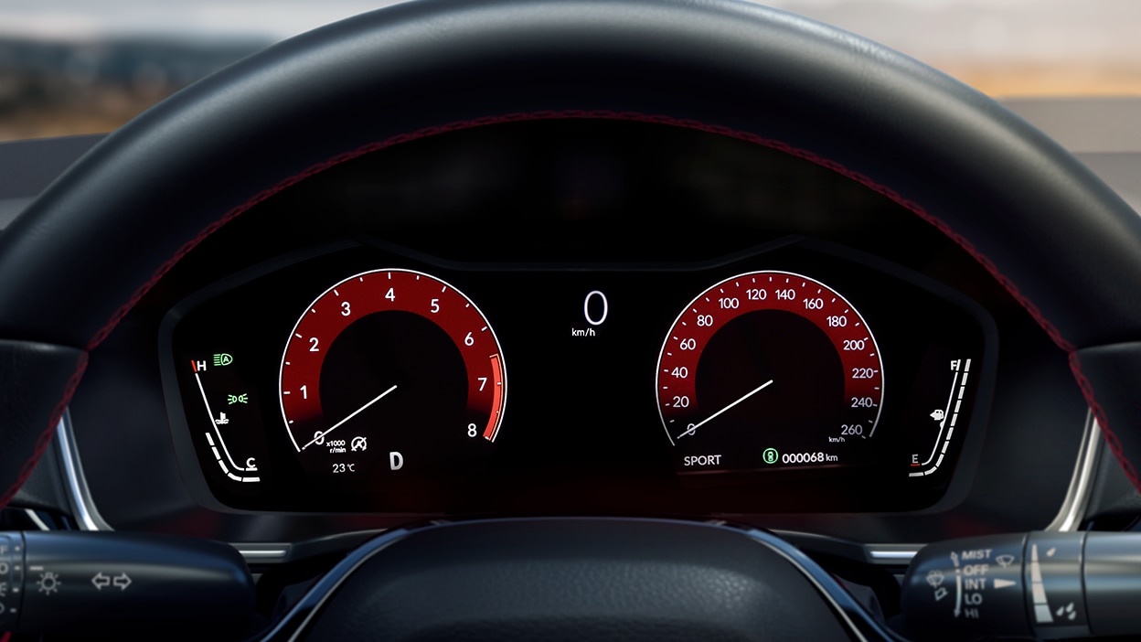 Closeup of TFT Driver Meter Display showing tachometer, speedometer, odometer, etc.