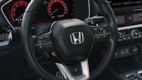 Closeup of steering wheel. 