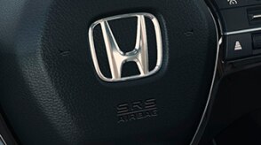 Closeup of steering wheel.