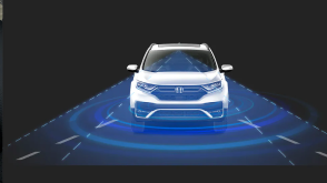 Front view of white CR-V. Blue sensor waves and lines emit from the front. 