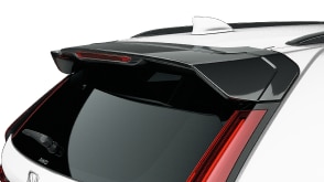 Closeup of the tailgate spoiler on a white HPD CR-V on white space. 