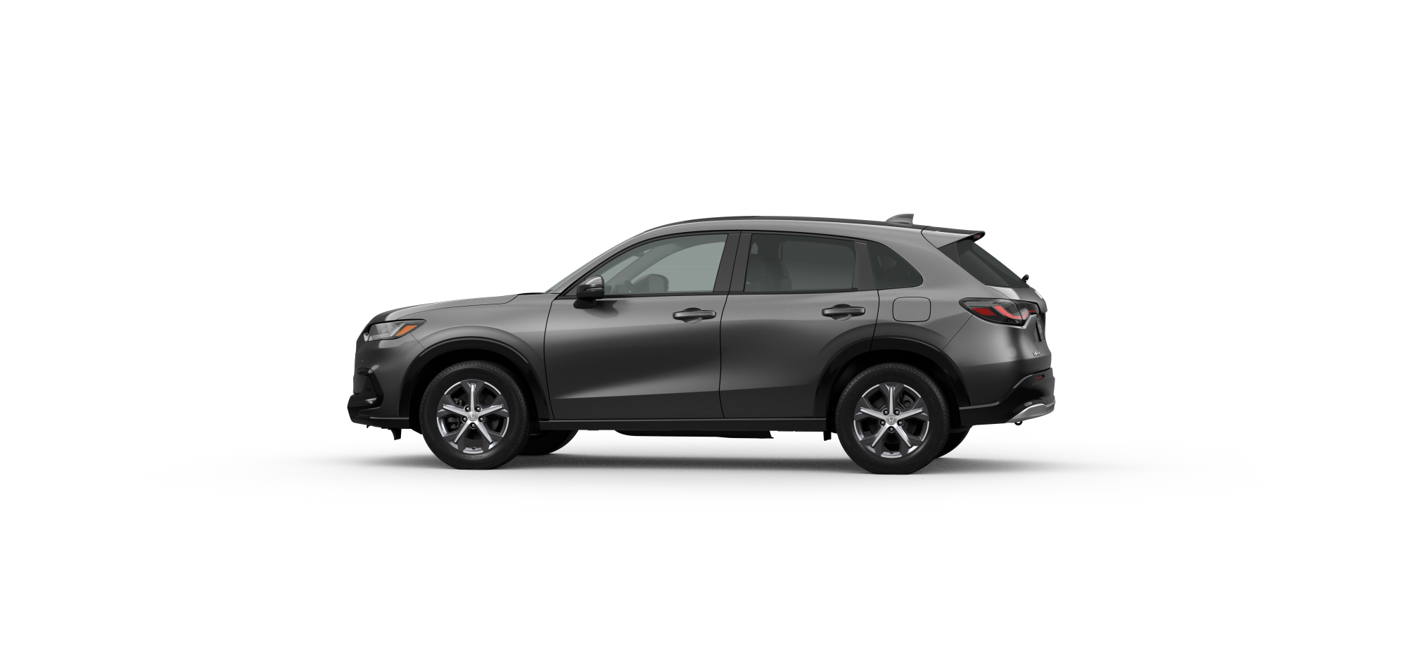 Side driver-side view of 2025 HR-V EX-L in Modern Steel Metallic colour on white space. 