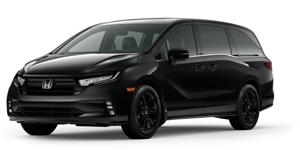 3/4 front view of black 2023 Honda Odyssey on white space.