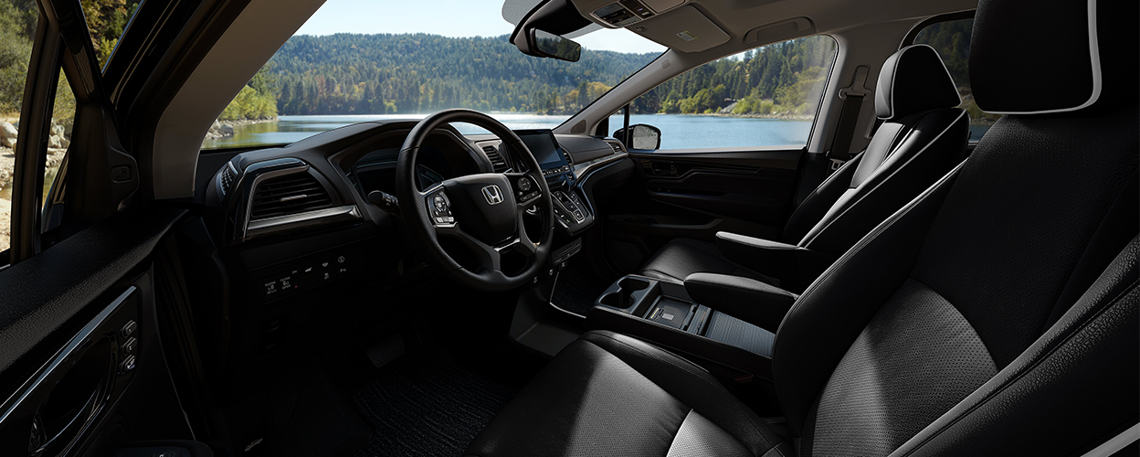 Interior view of Odyssey front seats; from driver’s side.