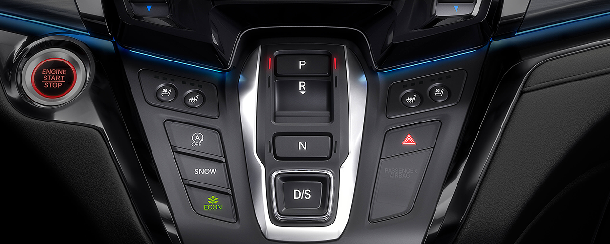 Closeup of centre console buttons.