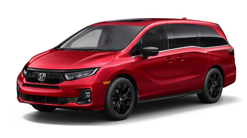 Vue latérale 3/4 avant d’une Odyssey rouge sur fond blanc.