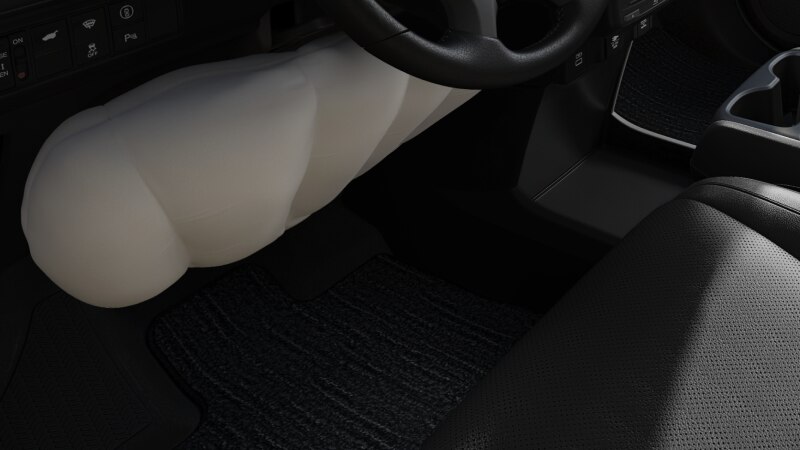 Gros plan du coussin gonflable déployé sous le volant.