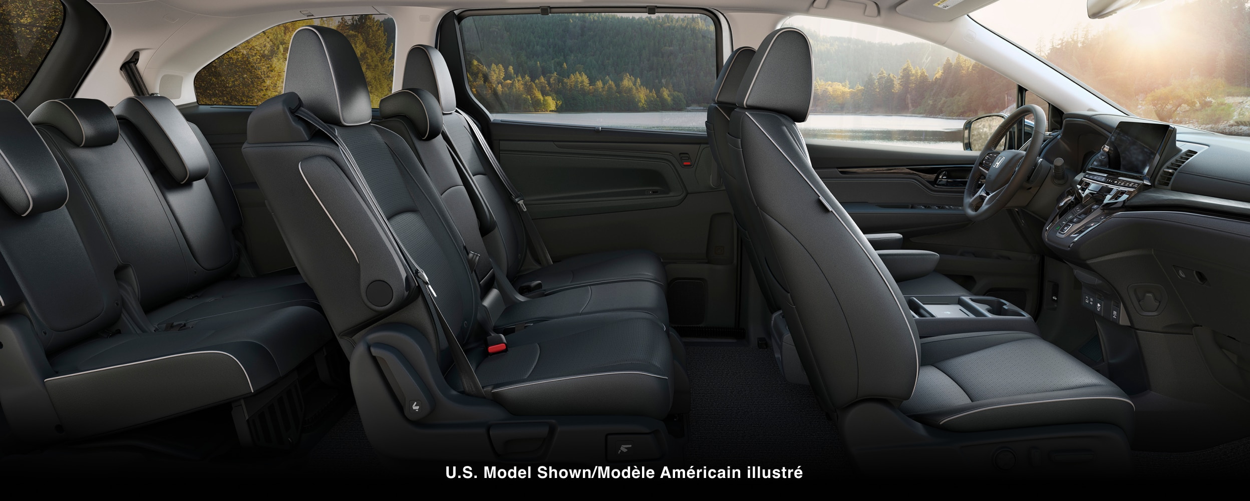 Wide side view of front and second row seats in an Odyssey.