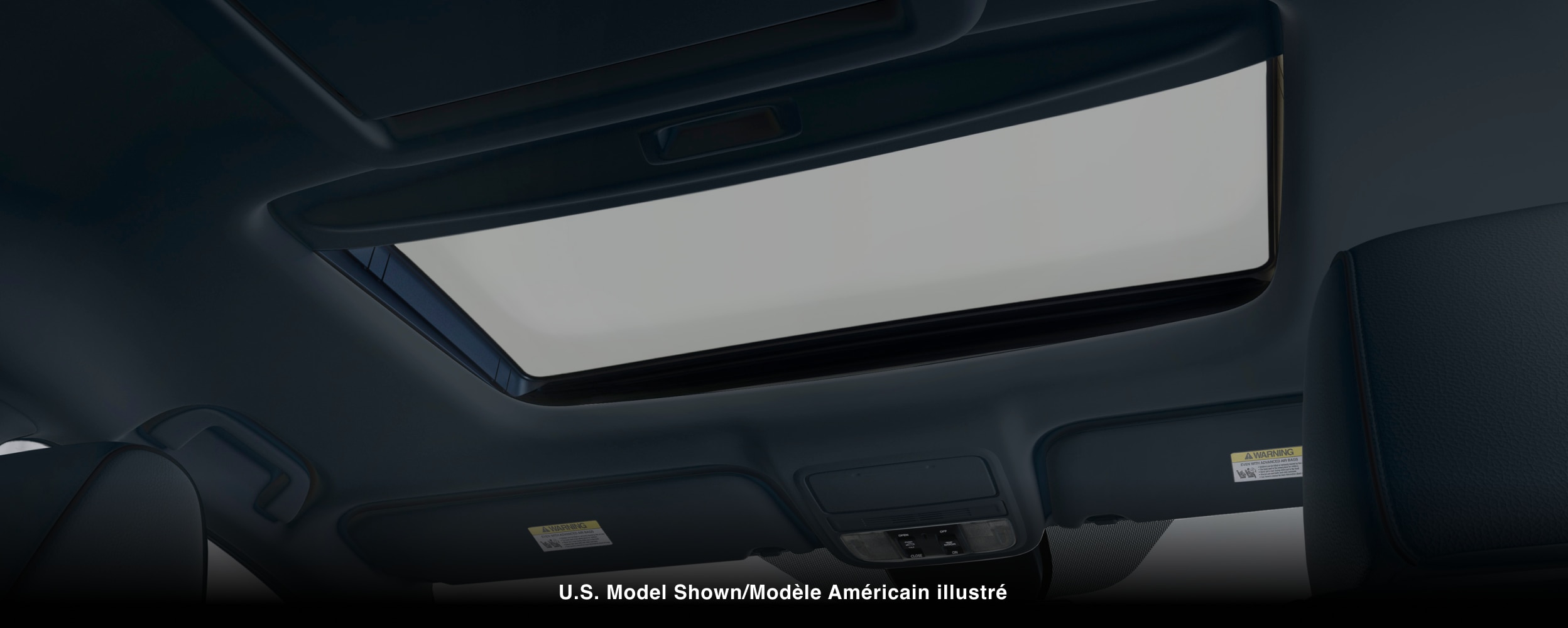 Interior worm’s eye view of moonroof.