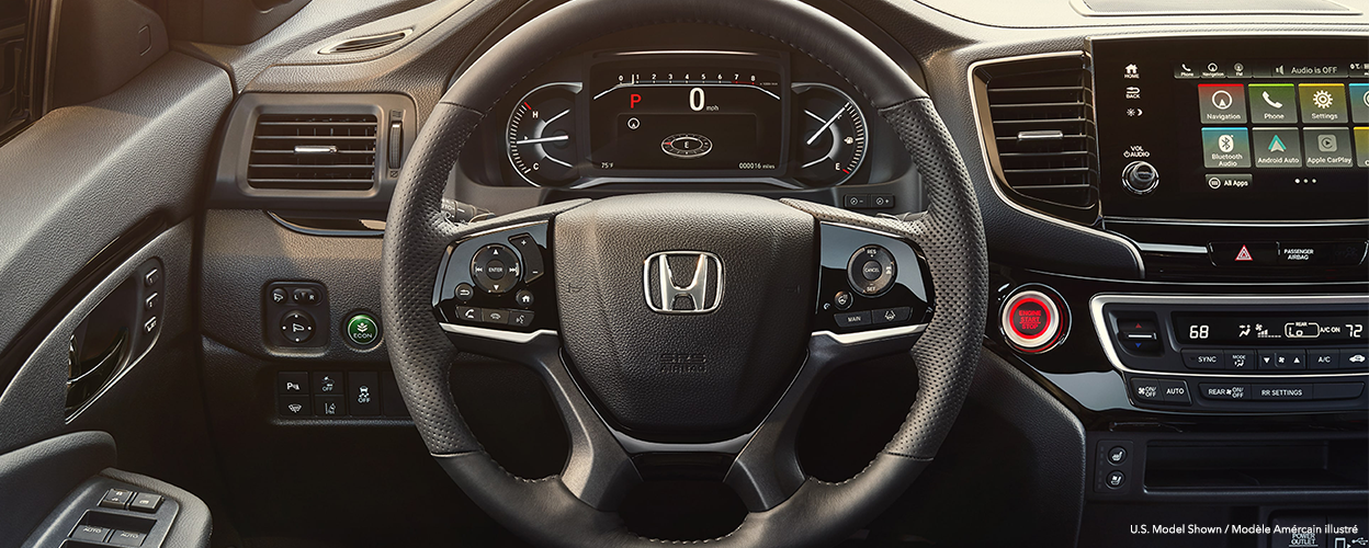 Closeup of steering wheel.