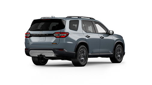 ¾ driver side rear facing view of 2023 Pilot TrailSport model in Sonic Grey Pearl colour