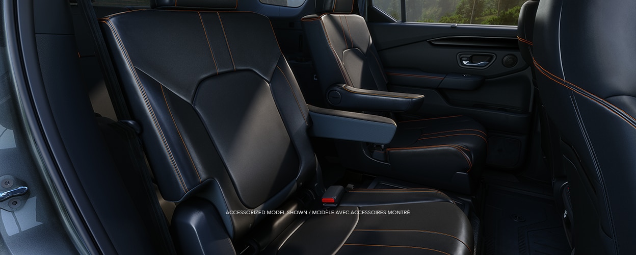 Honda Pilot Side view of the 2nd-row captain’s chairs.