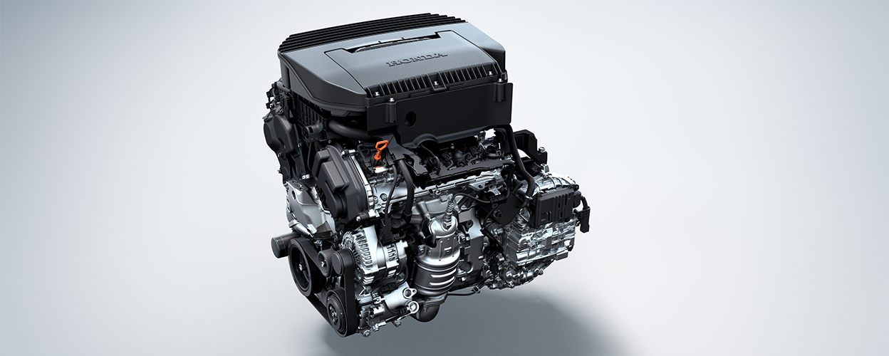 Gros plan d’un moteur sur un fond blanc.