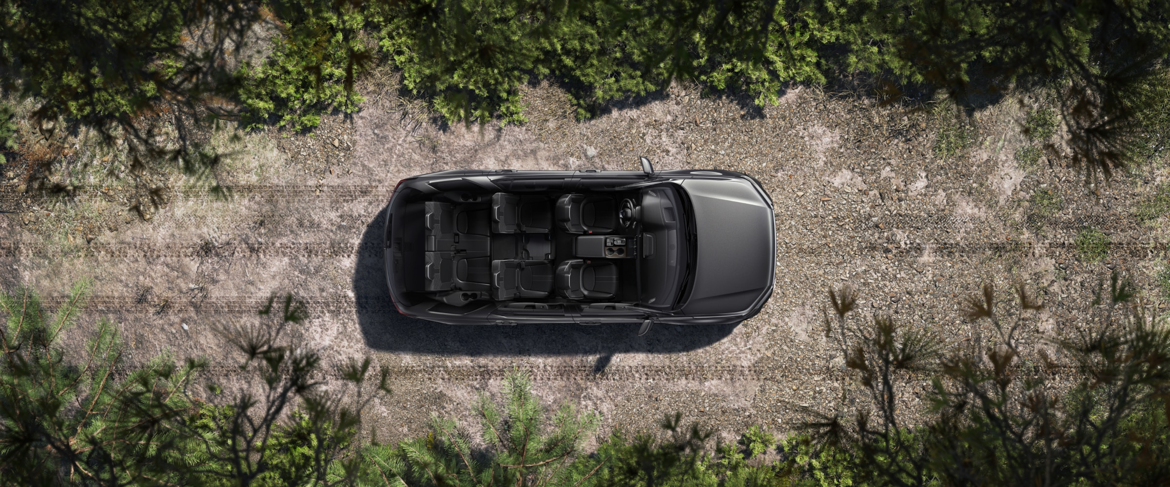 Top-down view of a grey Pilot with the roof removed, showcasing its interior.