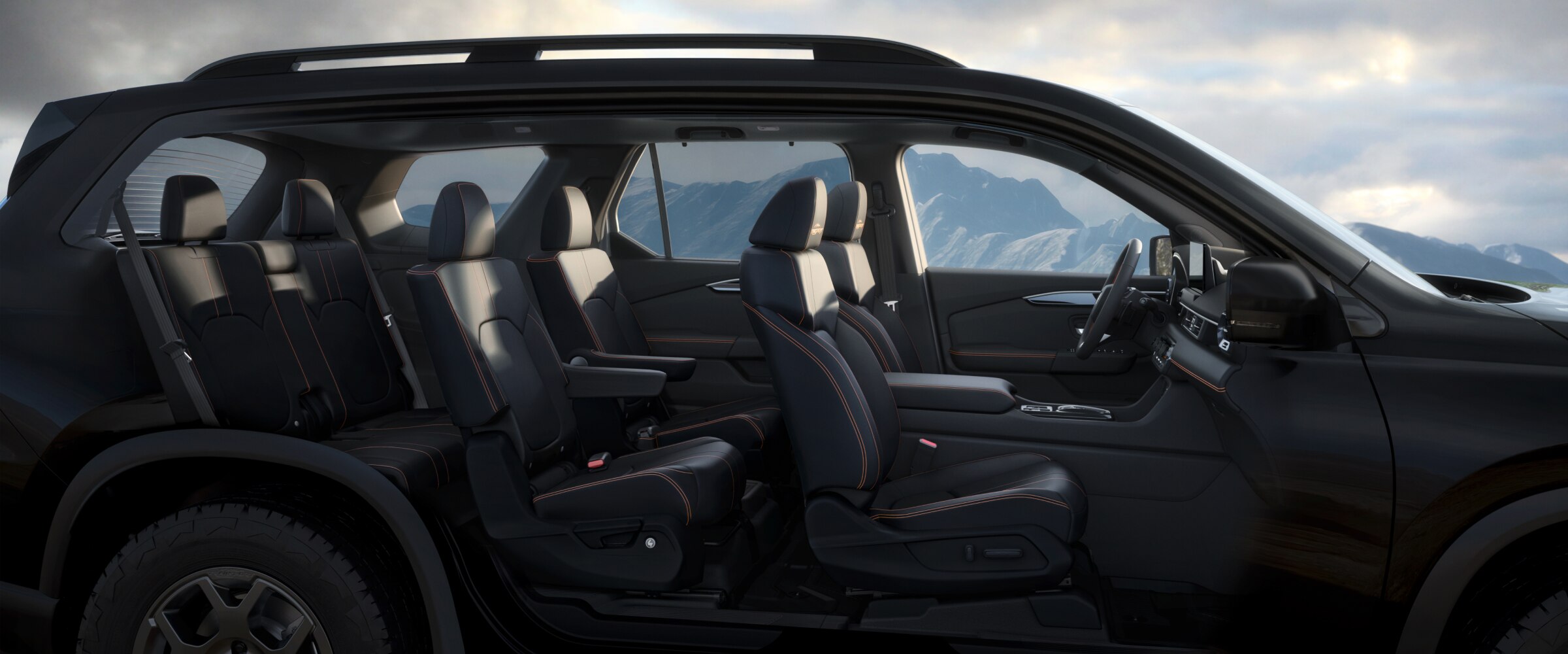 Vue latérale d’un Pilot dont les portes ont été retirées, révélant l’intérieur avec trois rangées de sièges.