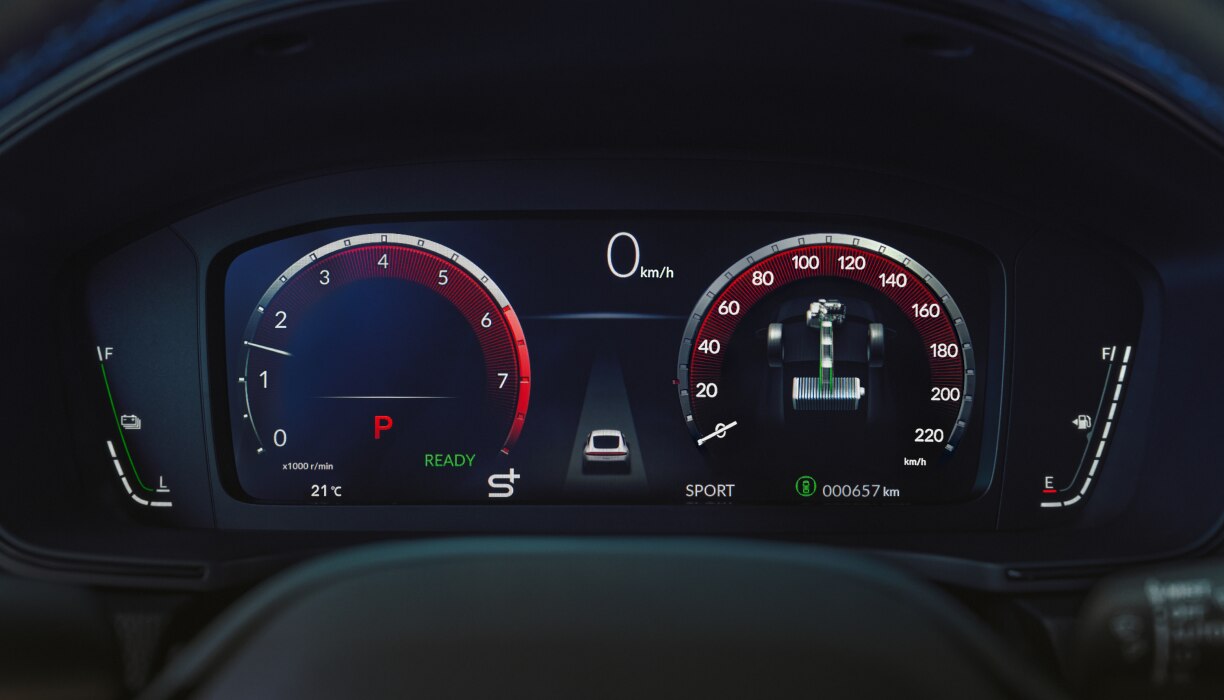 Closeup of Digital Instrument Cluster, showcasing speedometer, tachometer, odometer, and other info.