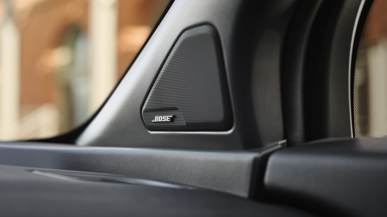 Closeup of speaker with BOSE logo.