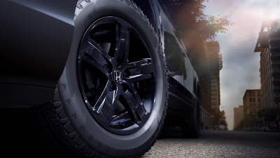 Closeup of black aluminum-alloy wheel on Ridgeline