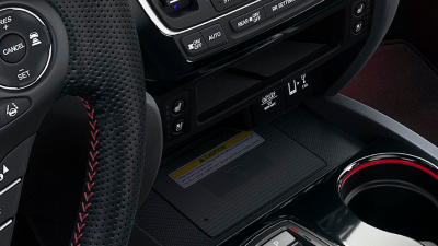 Closeup of wireless charging pad in centre console.