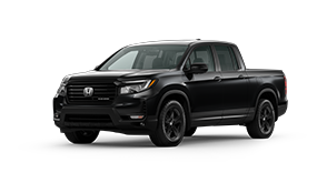 ¾ driver side front facing view of 2023 Ridgeline Black Edition model in Crystal Black Pearl colour
