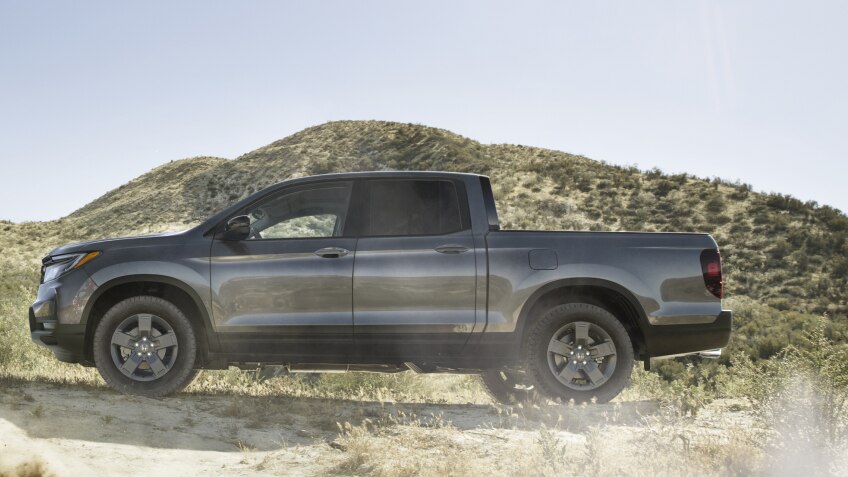 Side view of grey Ridgeline on desert hills.