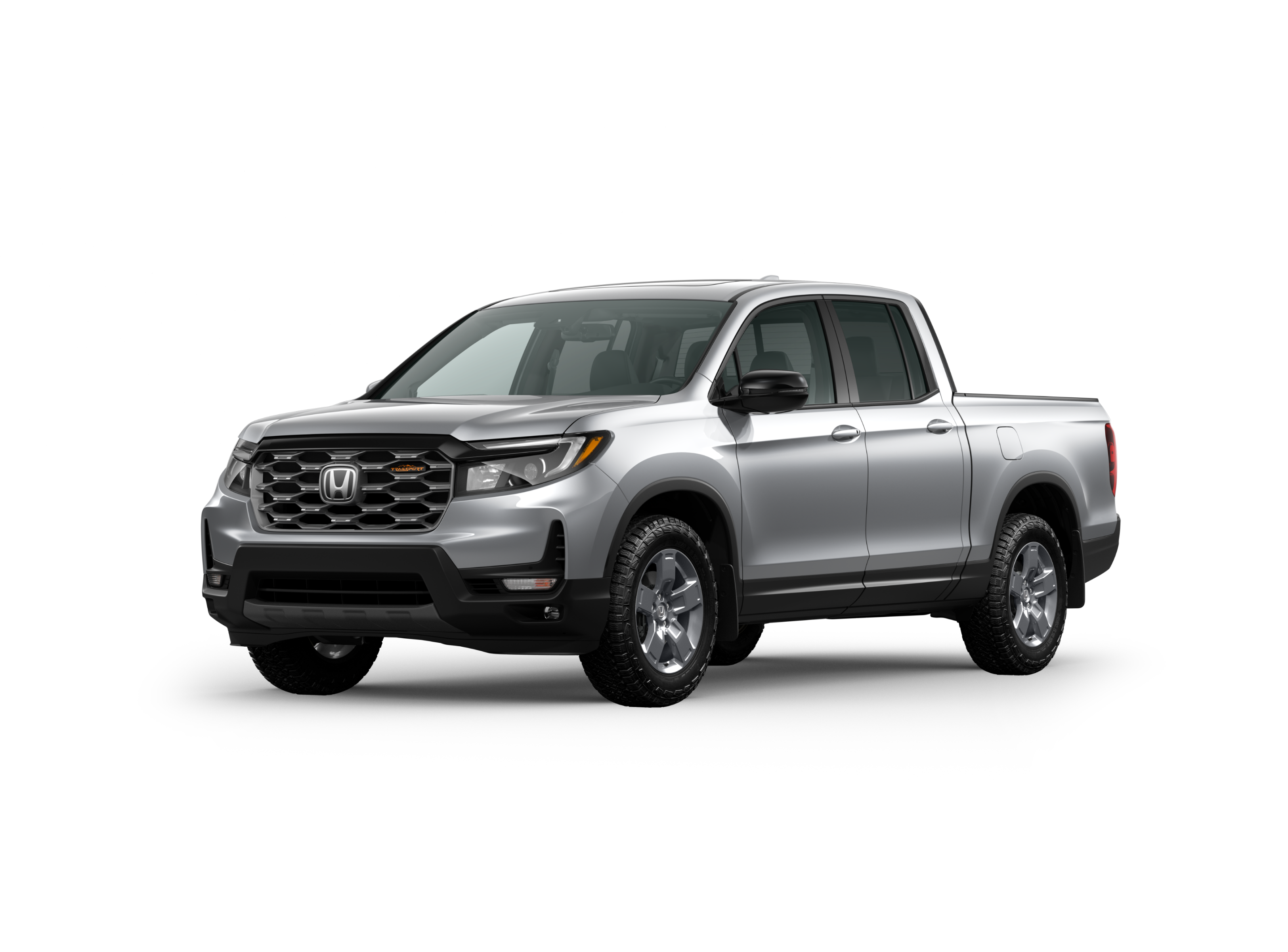 ¾ driver side front facing view of 2025 Ridgeline TrailSport model in Solar Silver Metallic colour