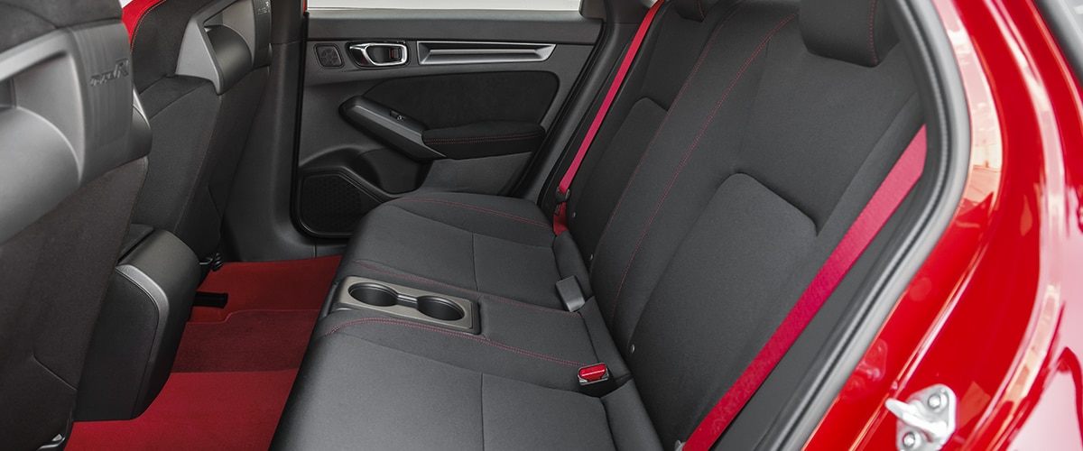 Sideview of rear seats on a red Type R.