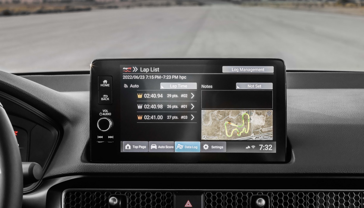 Closeup of the touchscreen displaying LogR™ recorded info: lap times and course map.