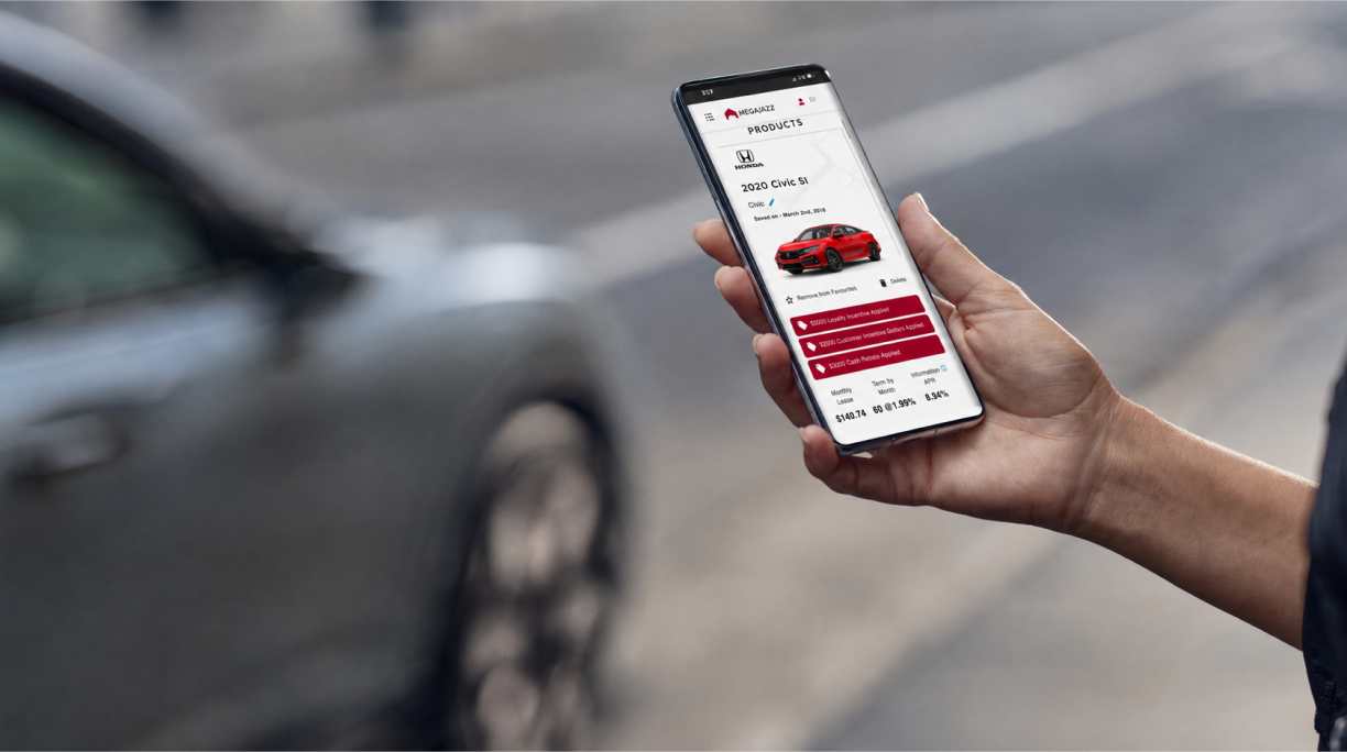 Man holding a mobile phone in his hand, displaying a ride-hailing app.