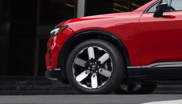 Medium close up of front wheel on a red Prologue.