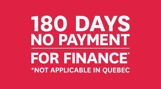 Person holding a tablet, visiting the Honda website