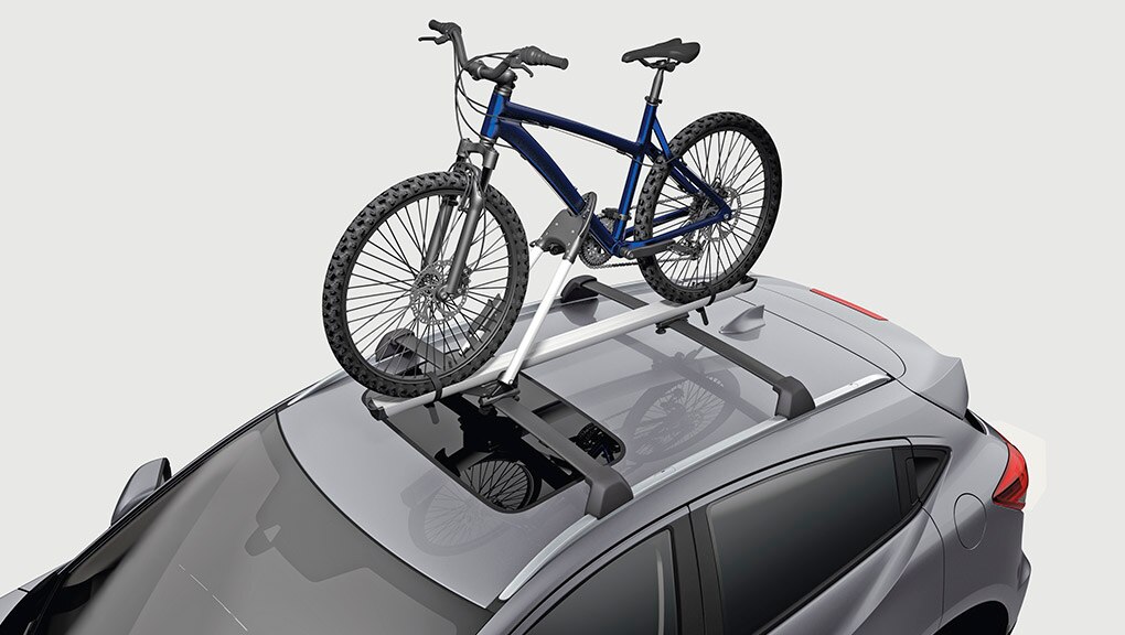 Top view of 2022 Honda HR-V accessorized with a roof rack and bike attached.