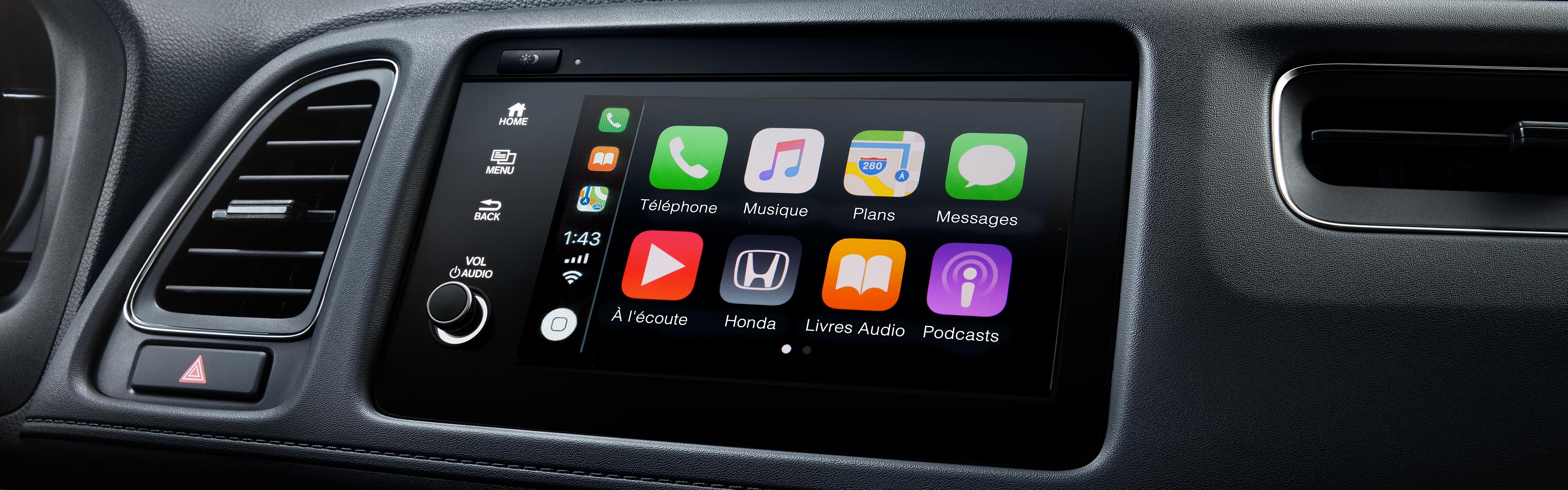 Plan rapproché du système Apple CarPlayMC/Android AutoMC sur l’écran tactile du Honda HR-V EX-L 2022. 