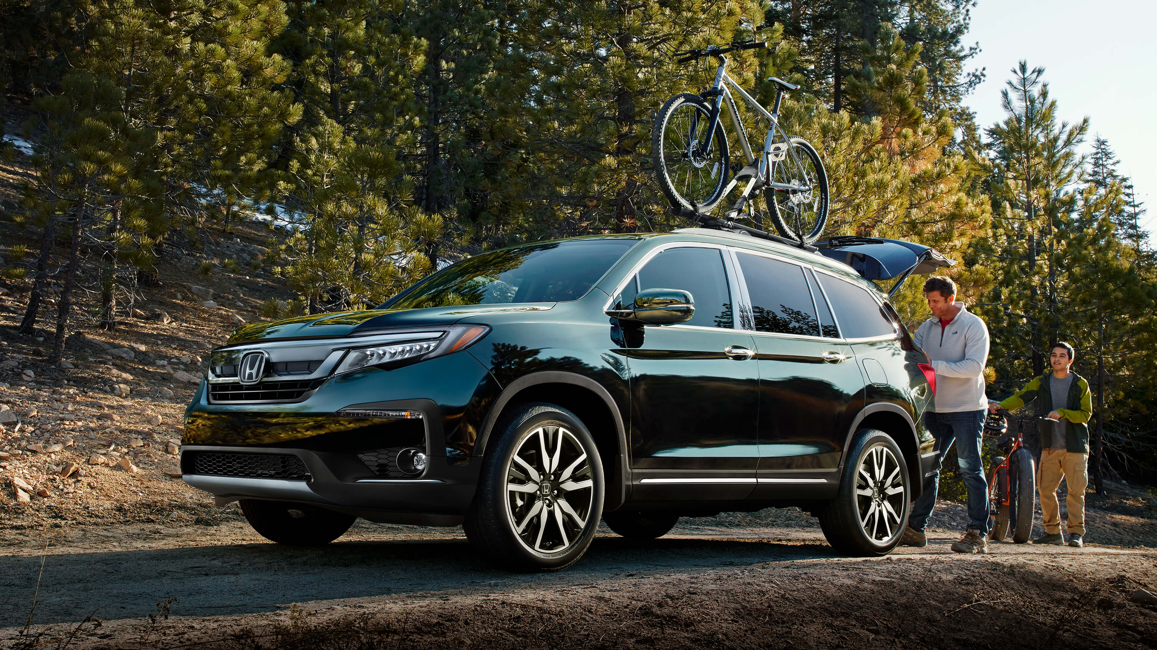 2020 Honda Pilot parked in the forest 